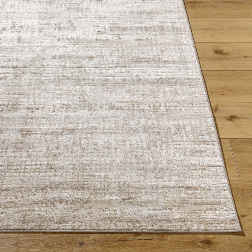 Close-up of the Odeya Area Rug. Cloud gray and medium gray tones with a subtle Southwestern pattern. Machine woven texture. Front