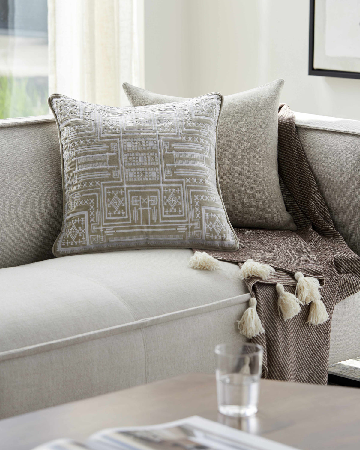 Kishi Beige Throw Pillow