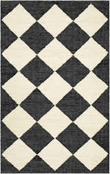 Close-up of the hand woven Sondo Jet Black Area Rug. Beige and jet black diamond pattern. Contemporary style. Design-Rectangle-576