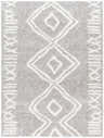 Close-up of the Asael Gray Area Rug, featuring a geometric diamond pattern and soft, shaggy texture. Design-Rectangle-537