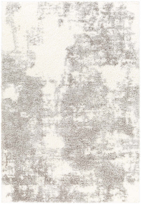 Close-up of the Azizi Area Rug; a shag rug in off-white and gray with a subtle, abstract pattern. Design-Rectangle-537