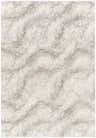 Close-up of the Giah Area Rug. Shag texture with bone, off white, and dark gray tones creating a subtle wave pattern. Design-Rectangle-537