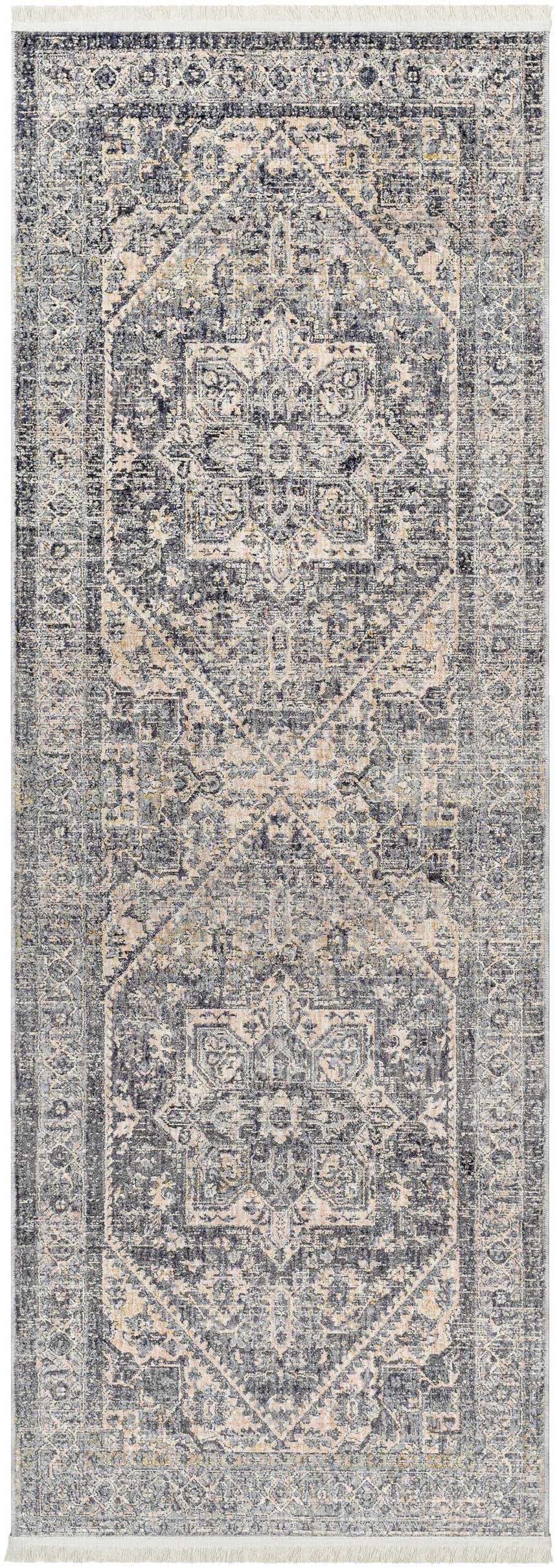 Close-up of the Ailsa Area Rug. Dark gray, lambswool, and taupe traditional pattern with a distressed look. Design-Runner-2108