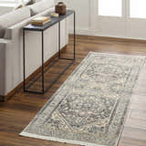 Living room scene with gray sofa, console table, and Ailsa Area Rug in dark gray, lambswool, and brown tones. Roomscene-Runner