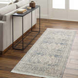 Living room scene with a beige sofa, console table, and Artan Area Rug runner in gray and brown tones. Roomscene-Runner