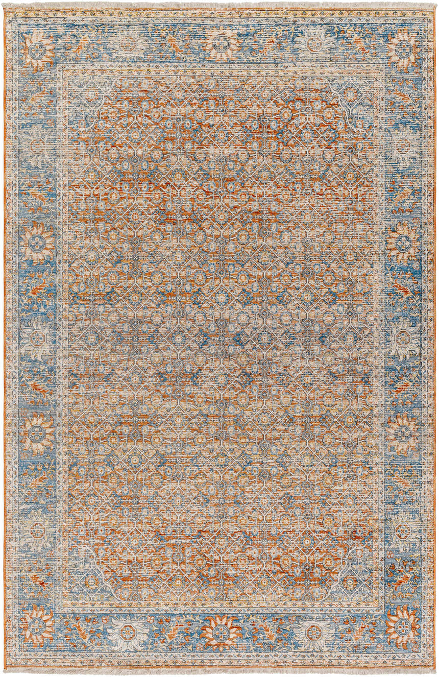 Detailed view of the Dalit Area Rug in clay, copper, denim, and driftwood hues with a traditional floral pattern. Design-Rectangle-537