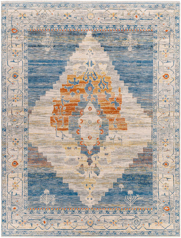 Close-up of the Shin Area Rug with a traditional diamond pattern in clay, copper, denim, and gray hues. Machine-woven polyester texture. Design-Rectangle-71010