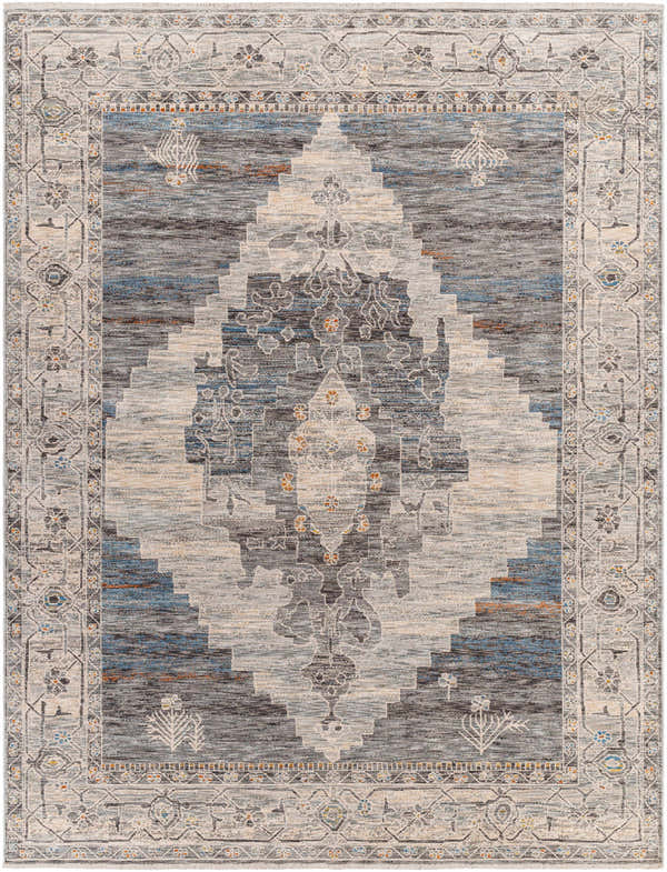 Close-up of the Unna Area Rug featuring a traditional diamond pattern in dusty sage, blue, and taupe tones. Design-Rectangle-71010