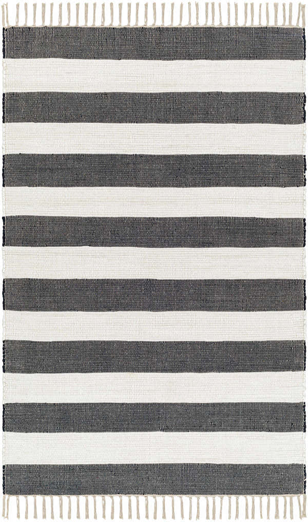 Close-up of the Moby Charcoal Area Rug, a hand woven cotton rug with bold black and white stripes and fringed edges. Design-Rectangle-576