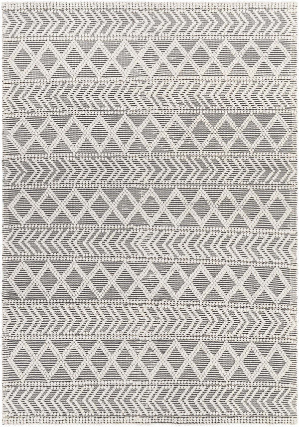 Close-up of the Chimamanda Area Rug featuring a geometric pattern in arctic stone and dark gray recycled PET yarn. Hand-woven texture. Design-Rectangle-576