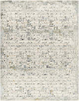 Close-up of the Chaka Textured Rug with Fringes. Off-white rug with a contemporary, distressed geometric pattern in gray, blue, and mustard. Design-Rectangle-710103