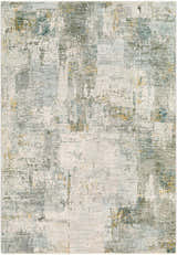 Close-up of the Elina Textured Abstract Rug. Features dusty sage, ink blue, light gray, and mustard hues in a contemporary design. Design-Rectangle-575