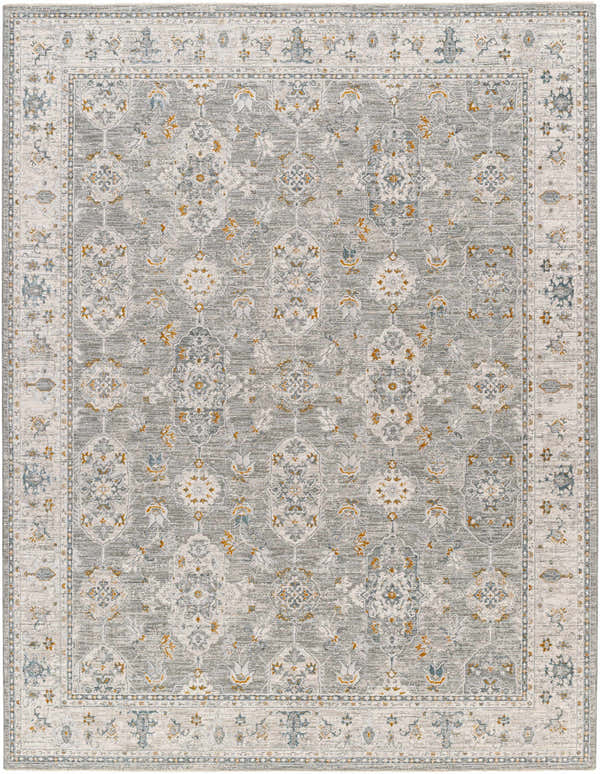 Close-up of the Hafsa Textured Rug. The rug has a traditional gray, light gray, and brown floral pattern. Design-Rectangle