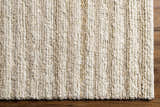 Close up of the Anaya Beige Area Rug showing its woven texture and neutral color palette. Corner
