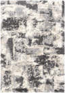 Close-up of the Selcuklu Area Rug, a shag rug in black, cream, light beige, and light gray. Contemporary style. Design-Rectangle-537