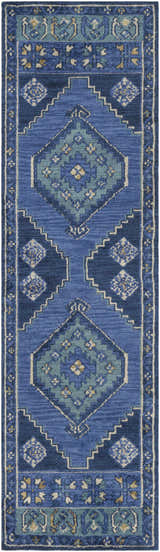 Close-up of the Selden Area Rug, featuring a geometric pattern in shades of blue, teal, and cream. Design-Runner-38
