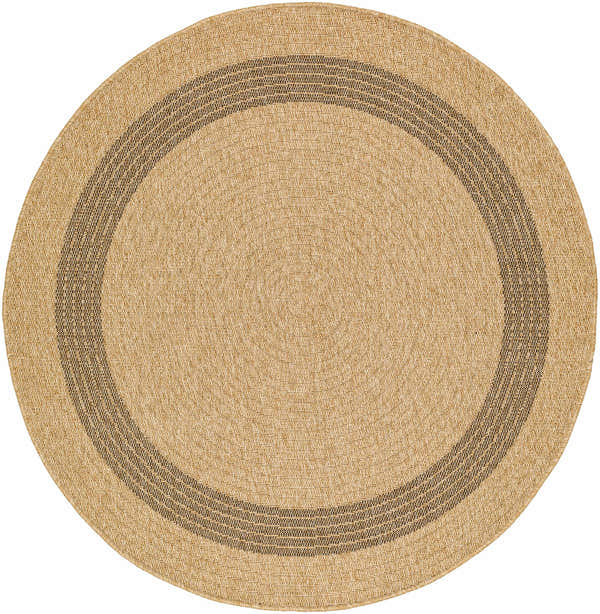 Close-up of round Andie Bordered Faux Jute Rug. Tan rug with a dark brown border. Machine woven texture. Design-Round-53