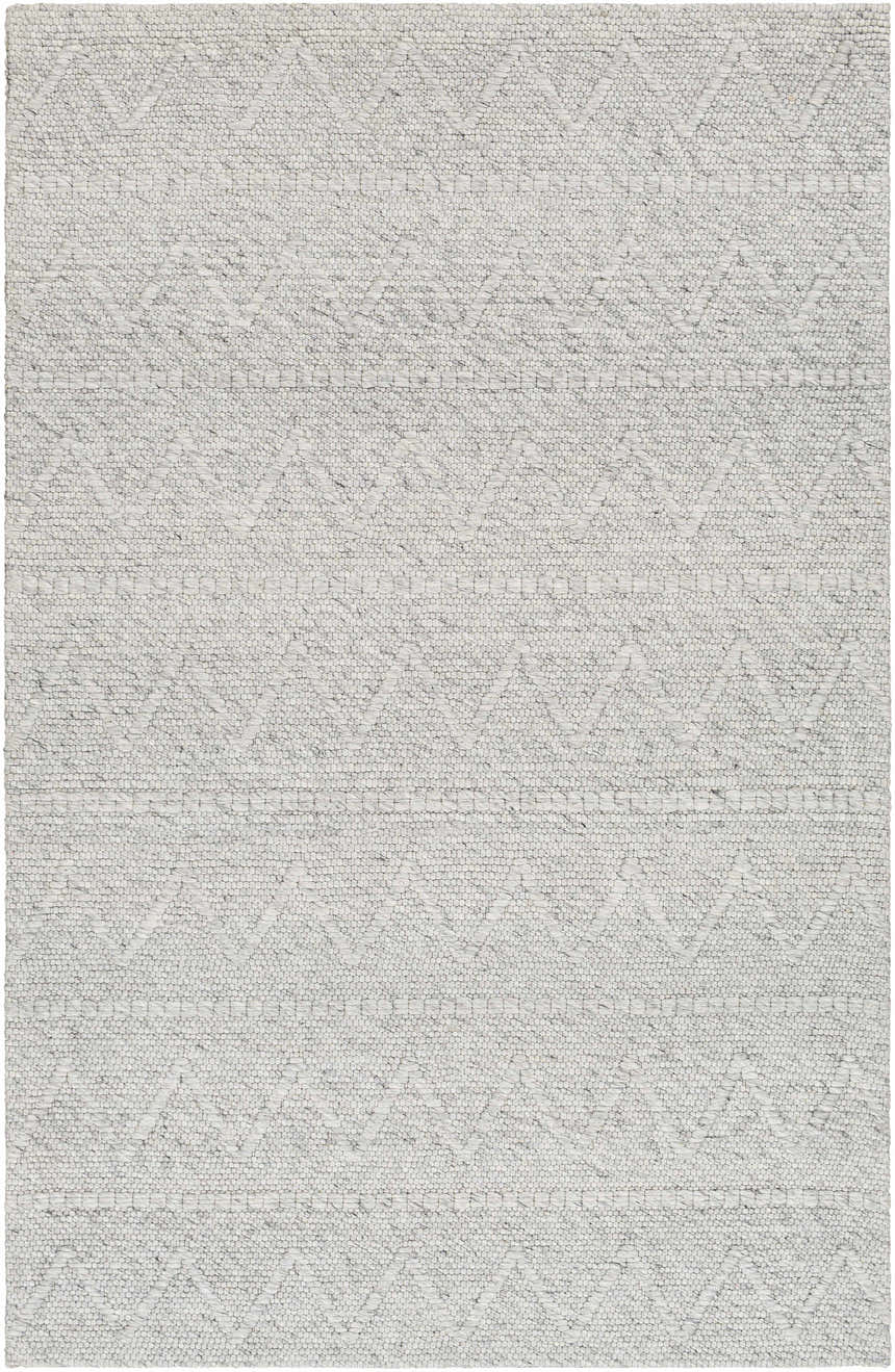 Close-up of the hand-woven Kyung Gray Area Rug showing its light gray color, geometric pattern, and textured wool blend. Design-Rectangle-576