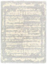 Close-up of the Gidja Gray Plush Area Rug, featuring a soft shag texture and abstract beige and gray pattern. Design-Rectangle-537