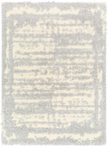 Close-up of the Gidja Gray Plush Area Rug, featuring a soft shag texture and abstract beige and gray pattern. Design-Rectangle-537