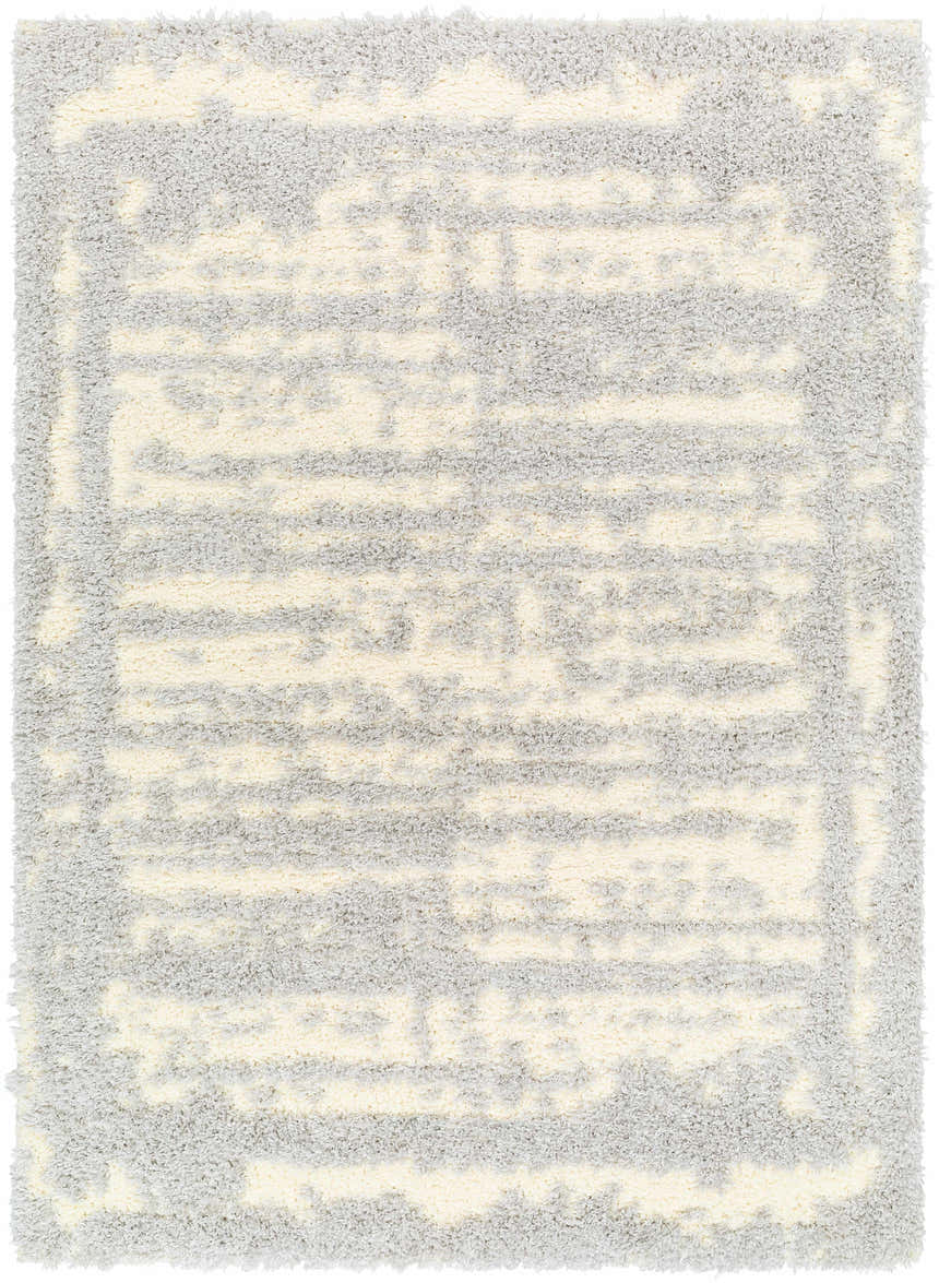 Close-up of the Gidja Gray Plush Area Rug, featuring a soft shag texture and abstract beige and gray pattern. Design-Rectangle-537