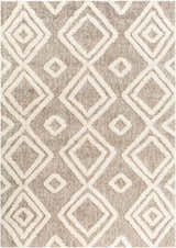Close-up of Nima Area Rug. Bone and cloud gray shag rug with geometric diamond pattern. Soft texture. Design-Rectangle-537