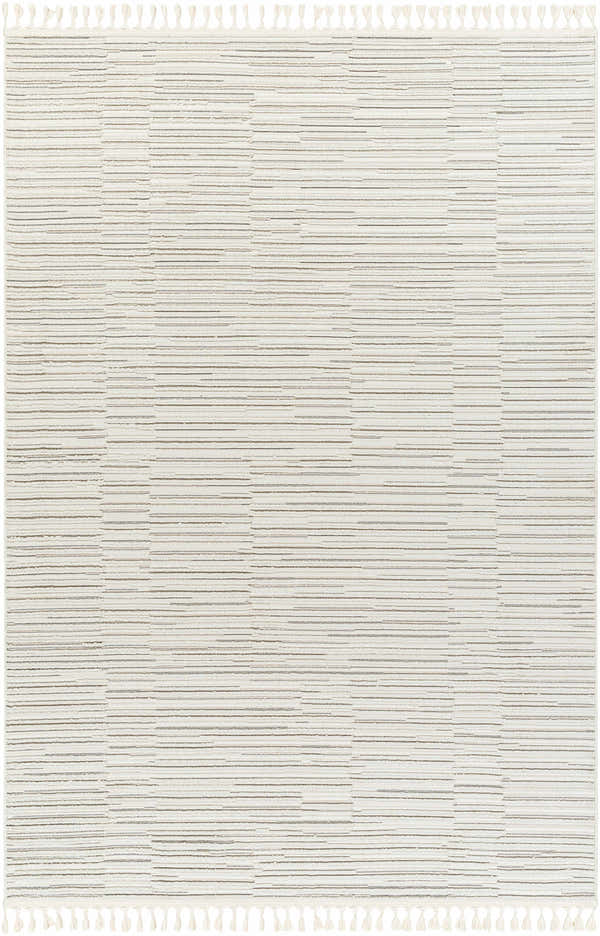 Close-up of the Cate Area Rug. Beige rug with a geometric pattern and tassels. Farmhouse style. Design-Rectangle-537