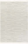 Close-up of the Cate Area Rug. Beige rug with a geometric pattern and tassels. Farmhouse style. Design-Rectangle-537