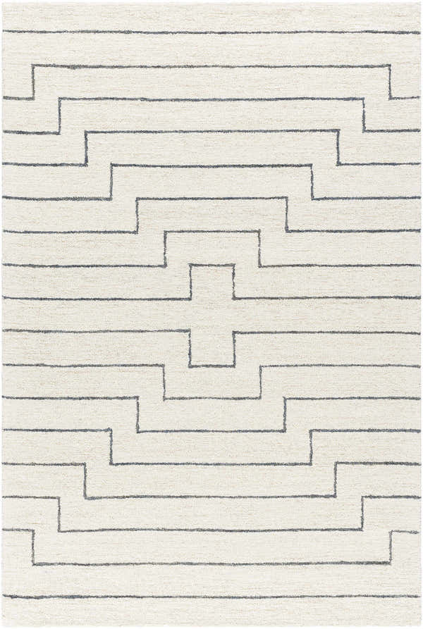 Close-up of the hand-tufted Wyome Area Rug. Off-white wool rug with a gray geometric pattern. Farmhouse style. Design-Rectangle-576