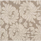 Close-up of the beige Sherard Area Rug featuring a large, contemporary floral pattern. Design-Square-73