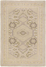 Close-up of the hand-knotted Shoemakersville Area Rug. Beige wool rug with dark brown and mustard geometric farmhouse pattern. Design-Rectangle-23