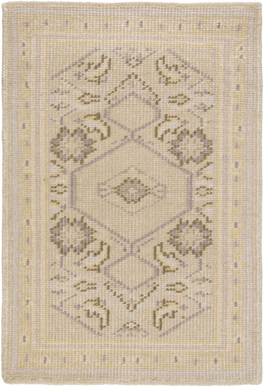 Close-up of the hand-knotted Shoemakersville Area Rug. Beige wool rug with dark brown and mustard geometric farmhouse pattern. Design-Rectangle-23