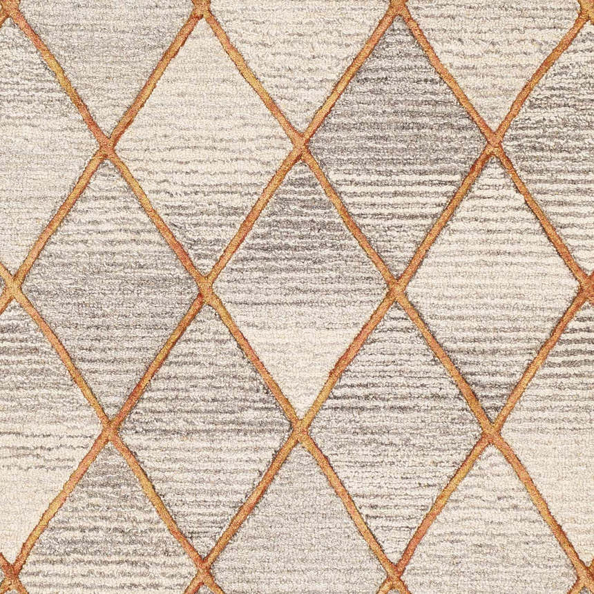 Close-up of the Sharpes Area Rug featuring a geometric diamond pattern in brown, mustard, and orange wool. Swatch