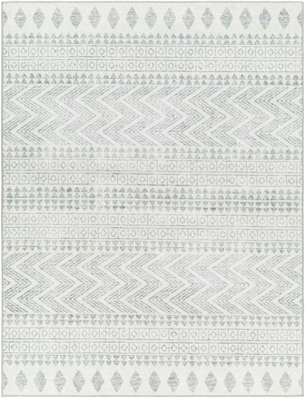 Close-up of the Danon Washable Area Rug. Features a gray geometric pattern with diamond, chevron, and square shapes on a white background. Design-Rectangle-537
