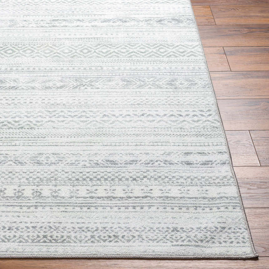Close-up of Gizeh Silverton Washable Area Rug featuring a gray, farmhouse-style geometric pattern on a soft, textured surface. Front