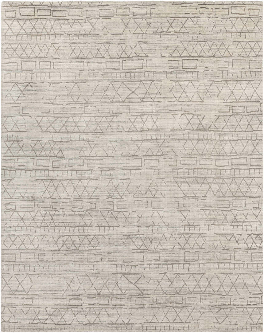 Close-up of the Shortland Premium Area Rug. Hand-loomed cotton and viscose rug in gray, ivory, and taupe with a geometric pattern. Design-Rectangle-810