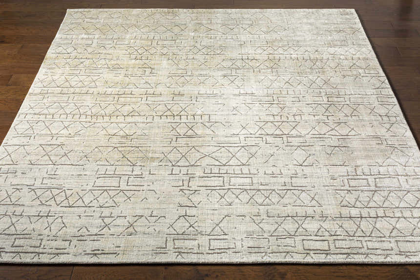 Close-up of Shortland Premium Area Rug. Bohemian style with geometric gray and ivory design. Hand-loomed texture. Front