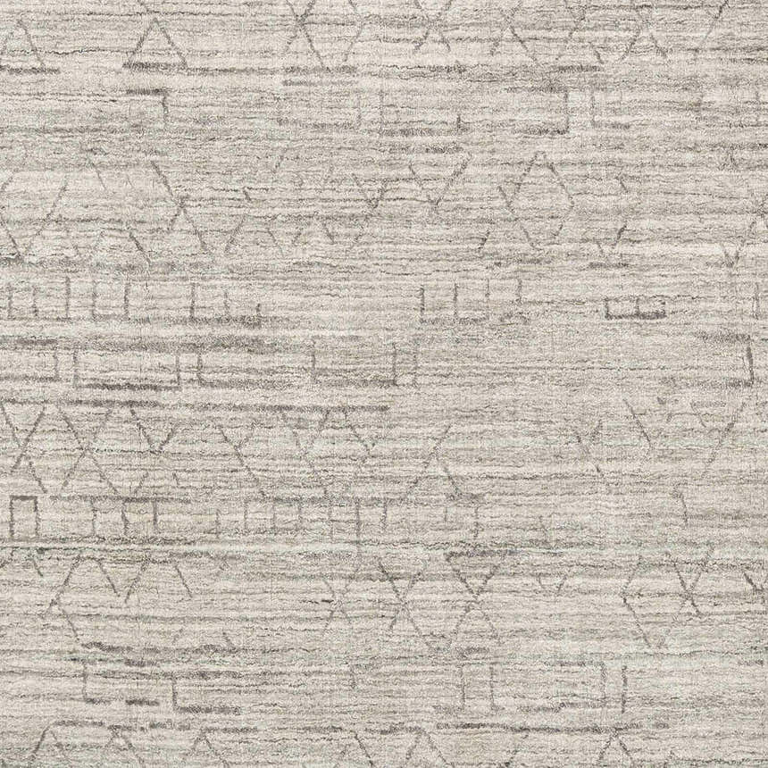 Close-up of Shortland Premium Area Rug. Hand-loomed cotton and viscose rug with a geometric gray and ivory pattern. Swatch