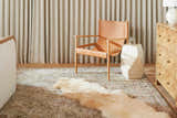 Living room scene with a tan leather chair on a Ange Tan Rich Textured Traditional Rug. Neutral tones and textures. Roomscene-Rectangle