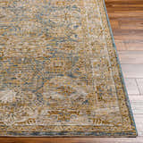 Close-up of the Ange Cream & Blue Rich Textured Rug showing its detailed traditional pattern and soft, textured weave. Front