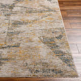 Close-up of the Cadao Rich Textured Traditional Rug, showcasing its light peach, mocha, and blue abstract pattern. Front