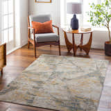 Living room scene with a Cadao Rich Textured Traditional Rug in light peach, mocha, and brown tones. Roomscene-Rectangle