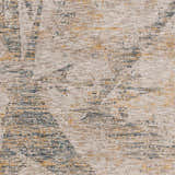 Close-up of the Cadao Rich Textured Traditional Rug, featuring light peach, mocha, multi brown, taupe, and walnut hues. Swatch