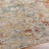 Close-up of the Chas Tan Rich Textured Traditional Rug, showing bone, clay, dark gray, and walnut colors. Texture