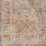 Close-up of the Cress Tan Rich Textured Traditional Rug, showing bone, blue, and rust colors in a farmhouse style pattern. Swatch
