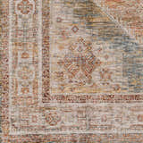 Close-up of the Moya Cream Rich Textured Traditional Rug, showcasing bone, clay, and dark gray colors. Swatch