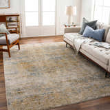 Living room scene with a Sava Tan Rich Textured Rug, sofa, and wood floors. Roomscene-Rectangle