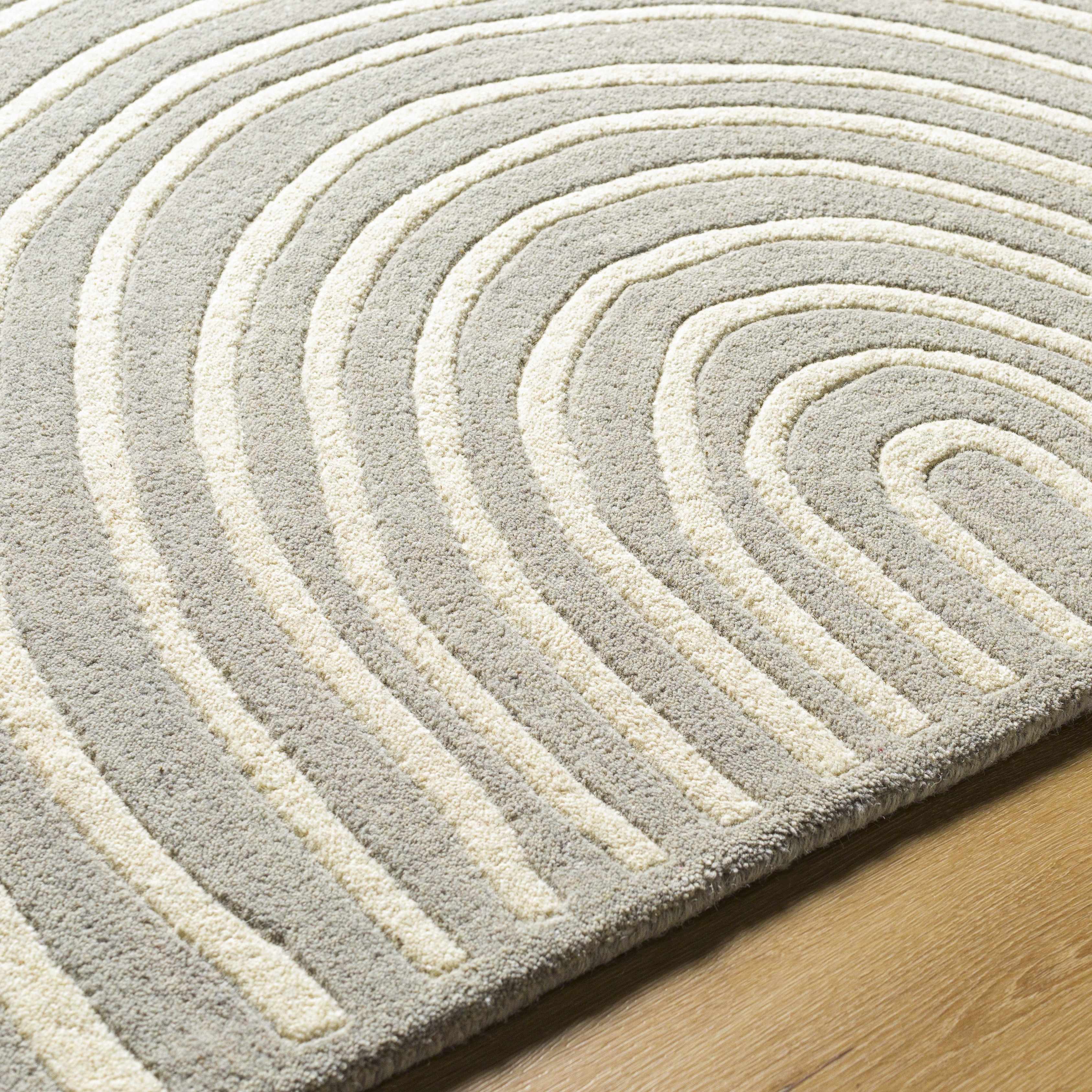 Close-up of the texture on Fuat Area Rug, showing fabric weave and feel. Contemporary Area Rug Backing Canvas 