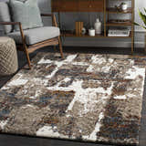 Living room scene with a Silvis Boutique Area Rug in burgundy, cream, blue, and gray. Modern decor with wood accents. Roomscene-Rectangle