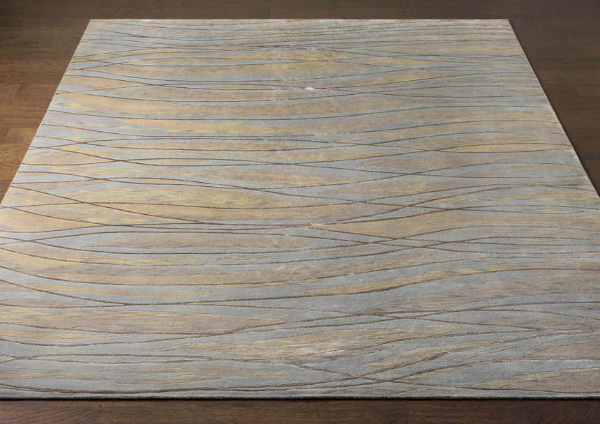 Close-up of Sinai Light Blue rug showing lined, contemporary design and wool/viscose texture. Front